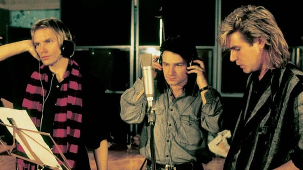 Sting, Bono, and Simon Le Bon of Duran Duran recording "Do They Know It's Christmas?" in 1984.